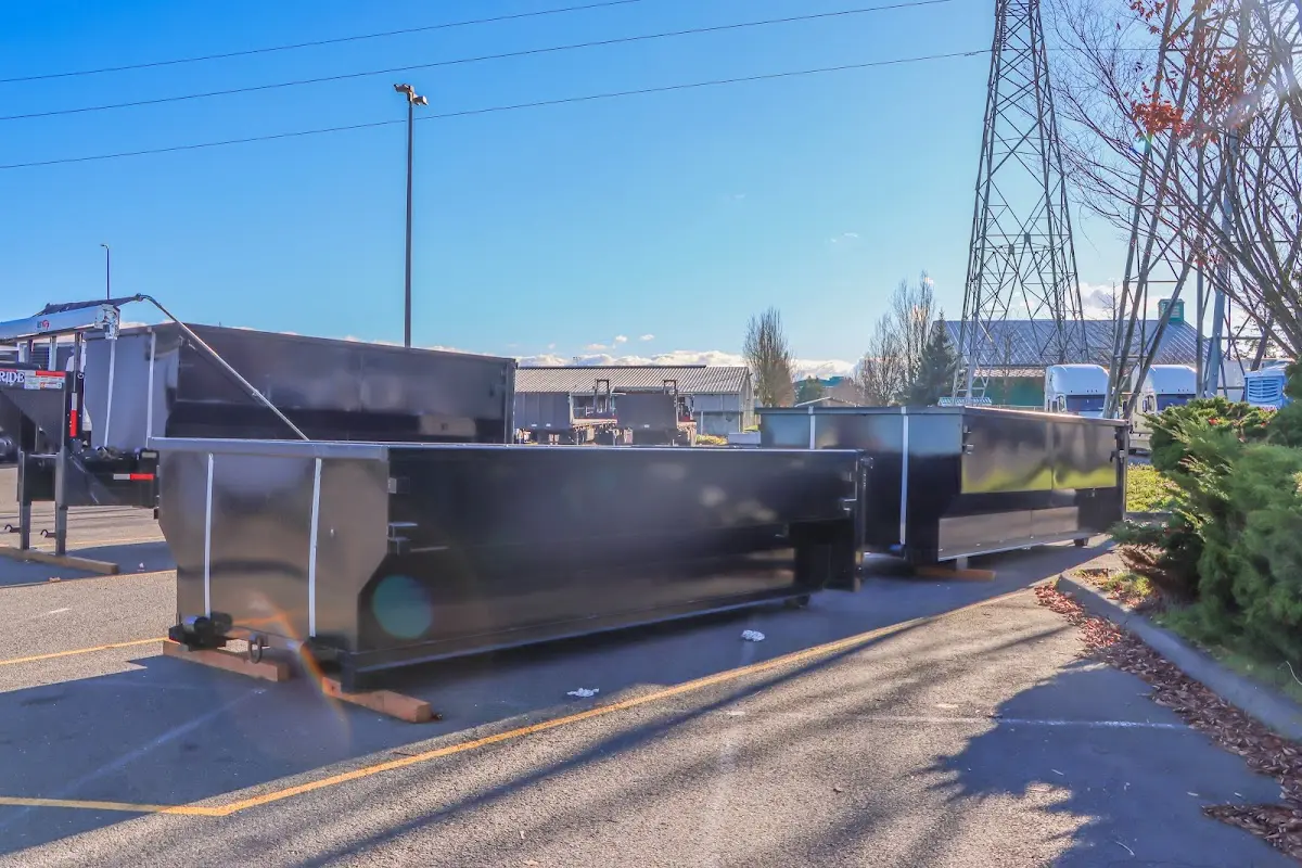 Roll-off dumpster ready for waste disposal at job site for Yard Waste Dumpster Rental in Fort Knox